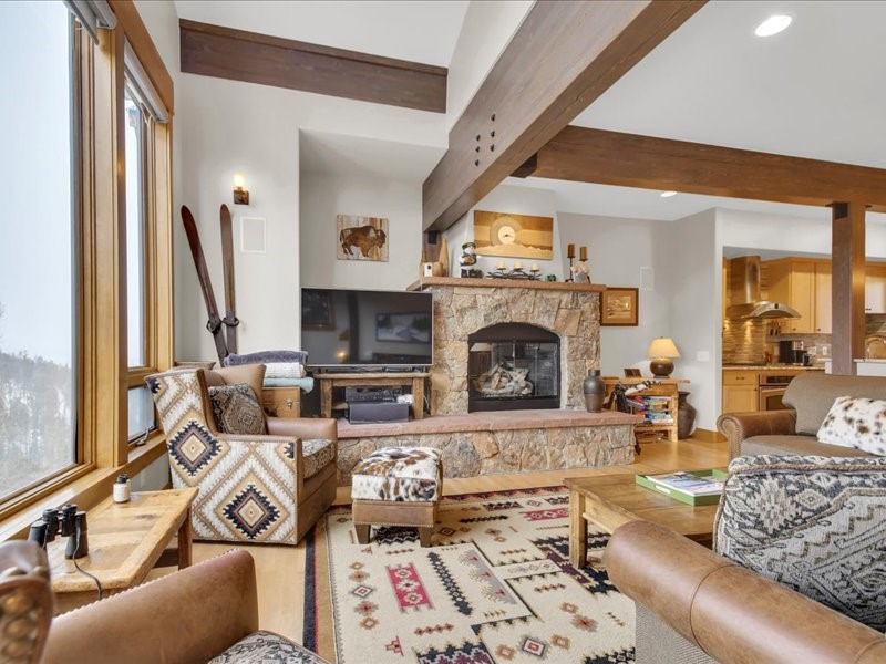 2584 Boreas Pass Road Breckenridge, CO 80424 - Photo 13 of 47 Living room, beamed ceiling and maple wood floors