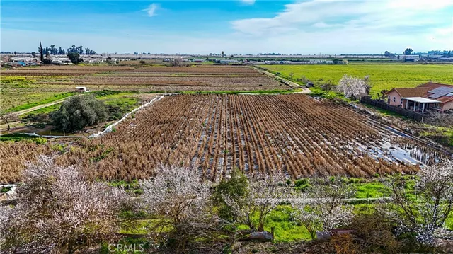 a view of a lake with a yard