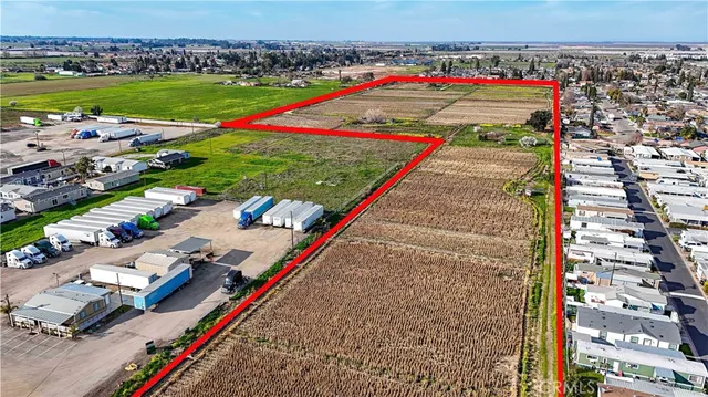 a view of swimming pool with a yard and sitting area
