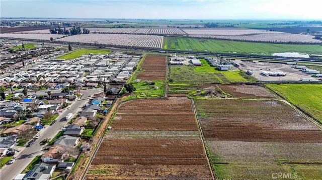 a view of a yard with an outdoor seating