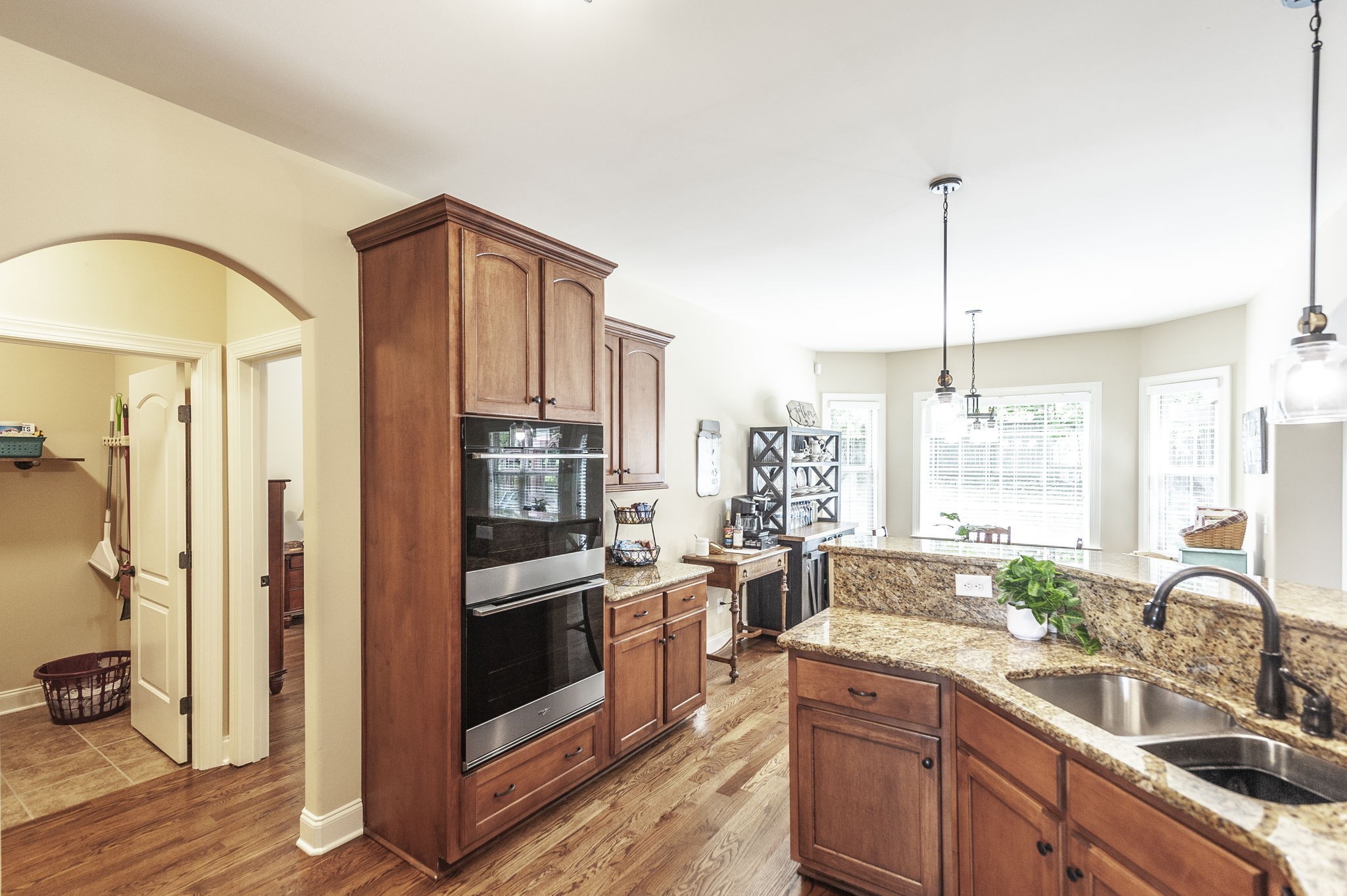 1017 Kendras Run Gallatin, TN 37066 - Photo 22 of 54 a kitchen with stainless steel appliances a refrigerator a sink a stove and white cabinets