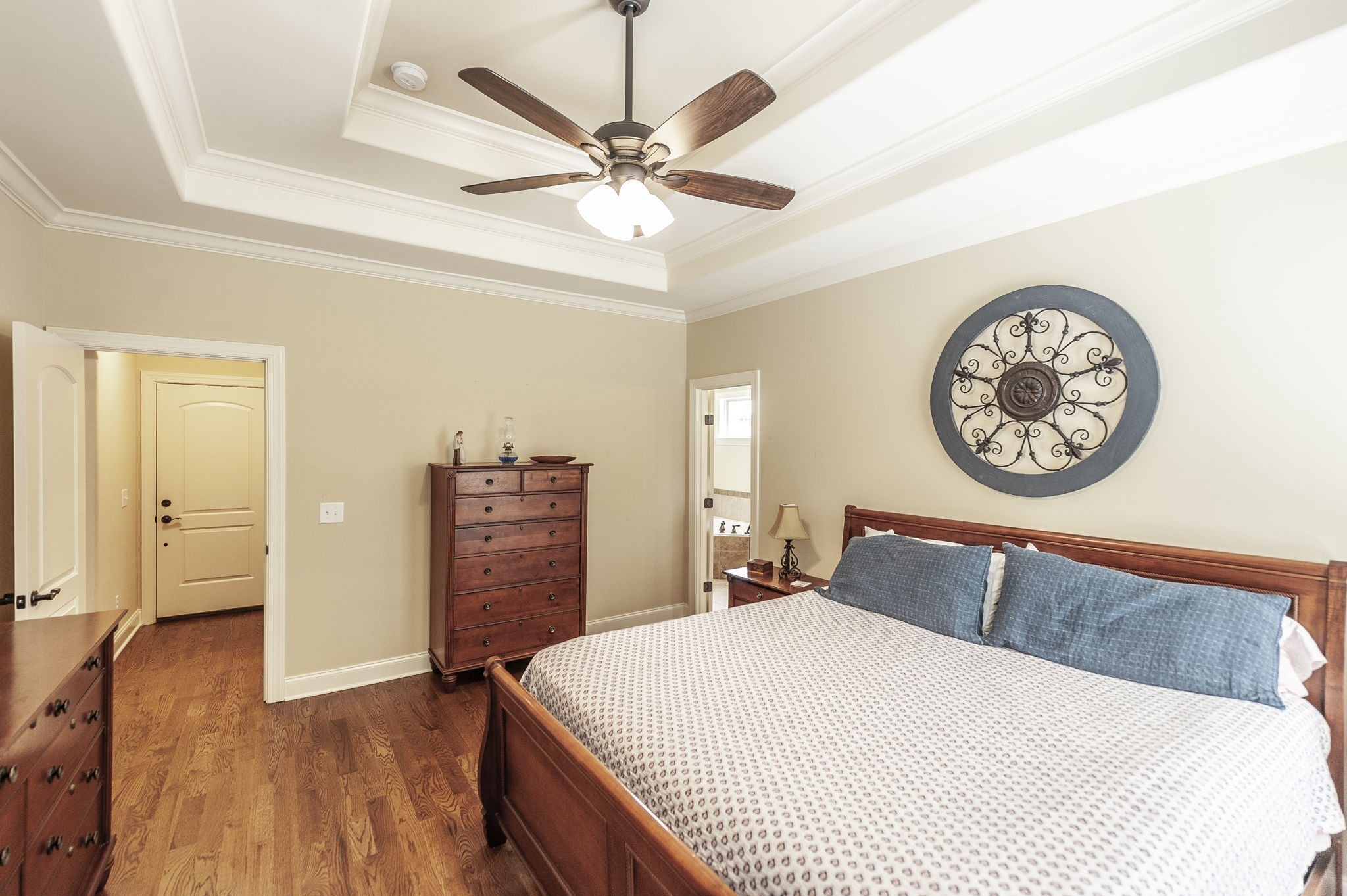 1017 Kendras Run Gallatin, TN 37066 - Photo 25 of 54 a bedroom with a bed and a chandelier