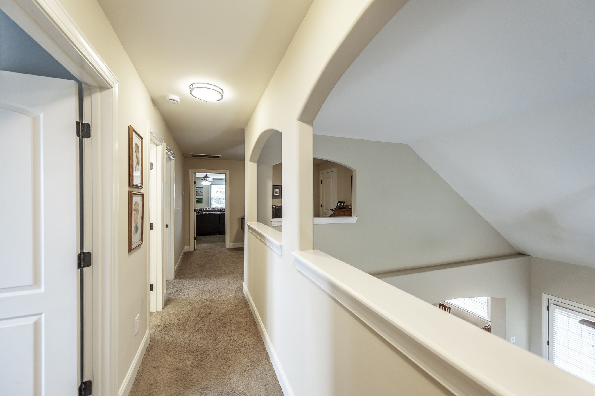 1017 Kendras Run Gallatin, TN 37066 - Photo 34 of 54 a view of a hallway with wooden floor and staircase