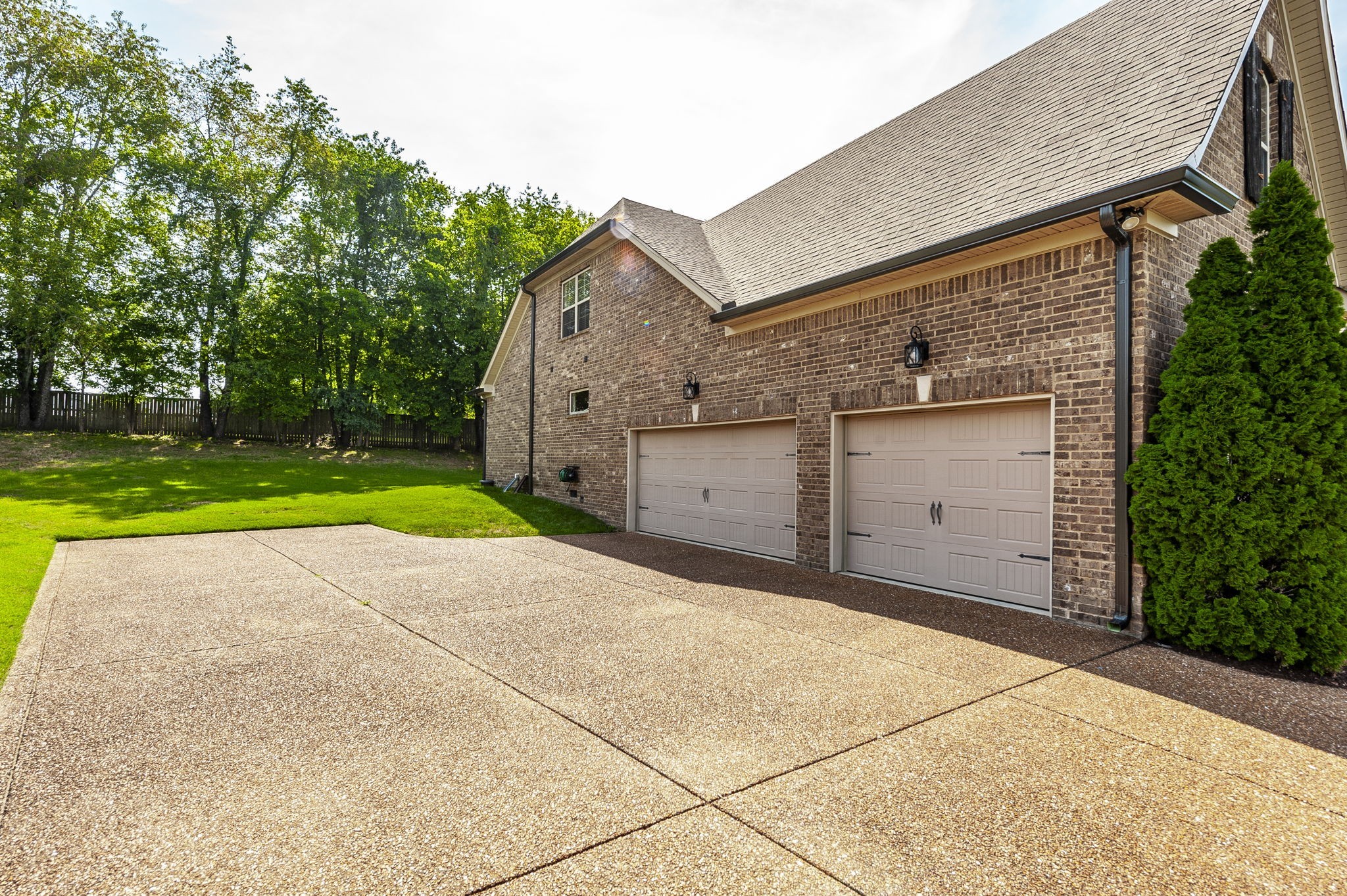 1017 Kendras Run Gallatin, TN 37066 - Photo 4 of 54 a view of backyard of house and garage