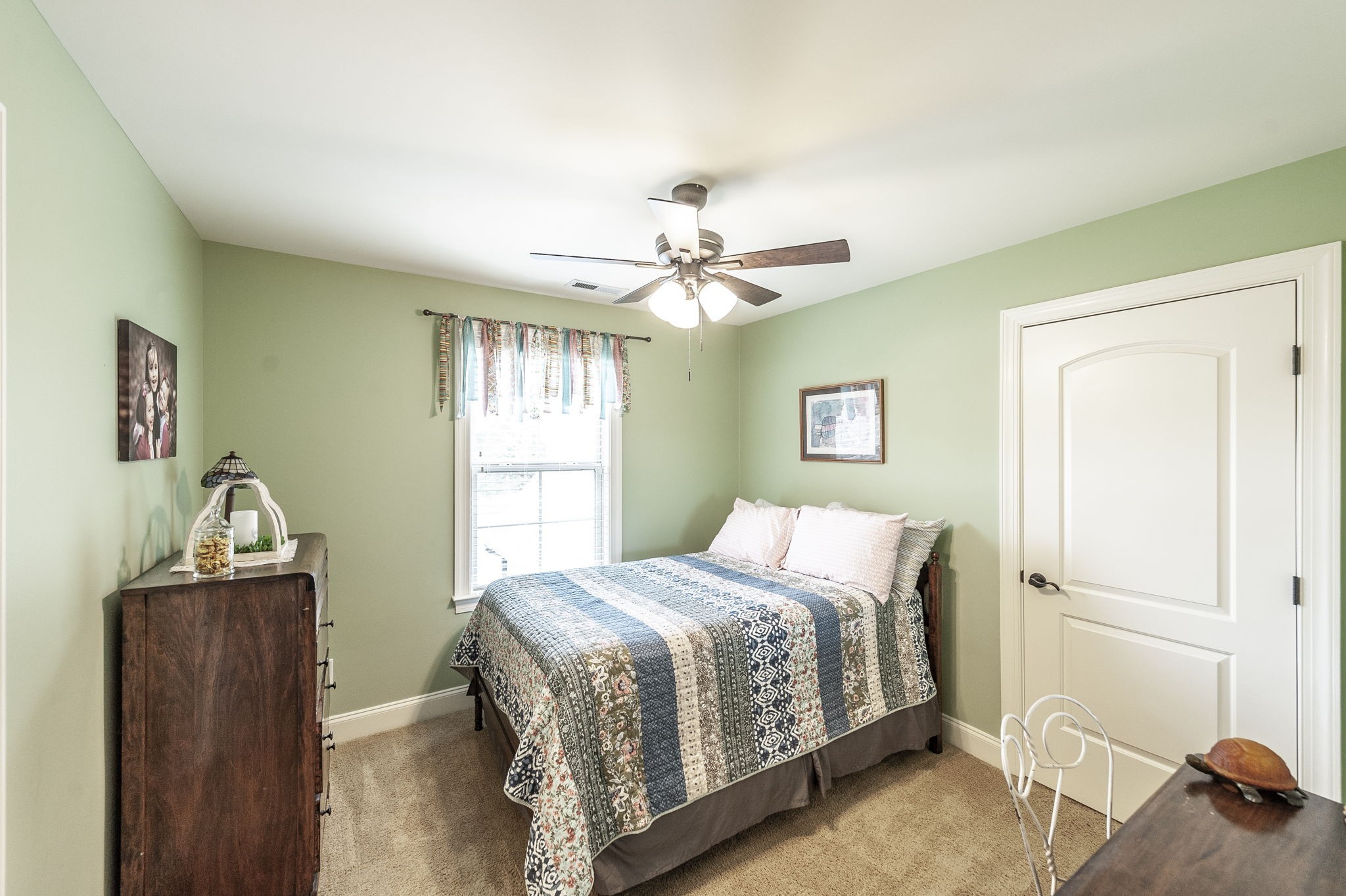 1017 Kendras Run Gallatin, TN 37066 - Photo 42 of 54 a bedroom with a bed and a window