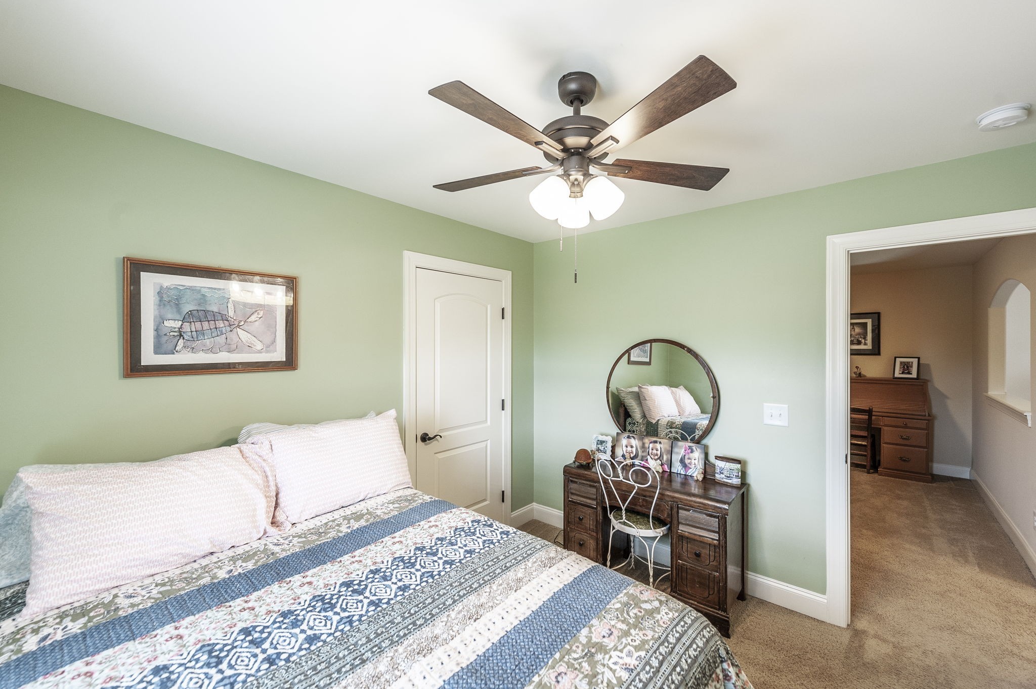 1017 Kendras Run Gallatin, TN 37066 - Photo 43 of 54 a bedroom with a bed and a chandelier