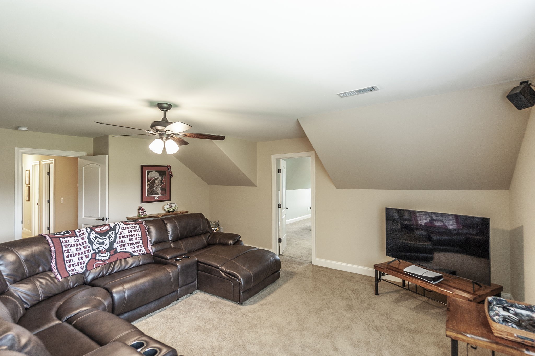 1017 Kendras Run Gallatin, TN 37066 - Photo 45 of 54 a living room with furniture a flat screen tv and a window