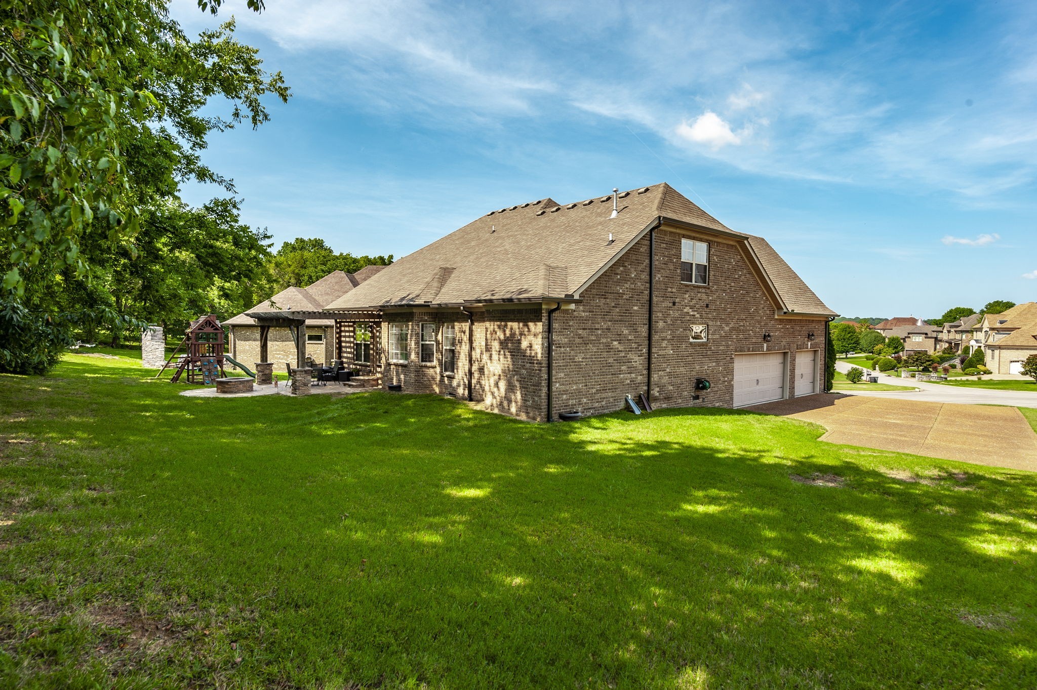 1017 Kendras Run Gallatin, TN 37066 - Photo 49 of 54 a view of a house with a yard