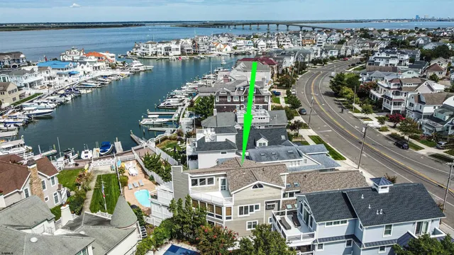 a view of a lake with a table and a chairs