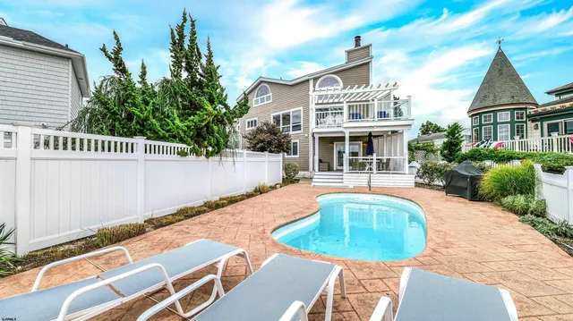 front view of a house with swimming pool