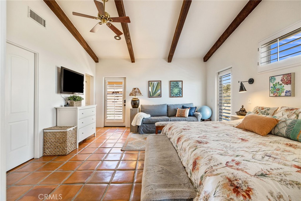 60150 Santa Rosa Road Mountain Center, CA 92561 - Photo 29 of 49 a bedroom with double bed and a flat screen tv