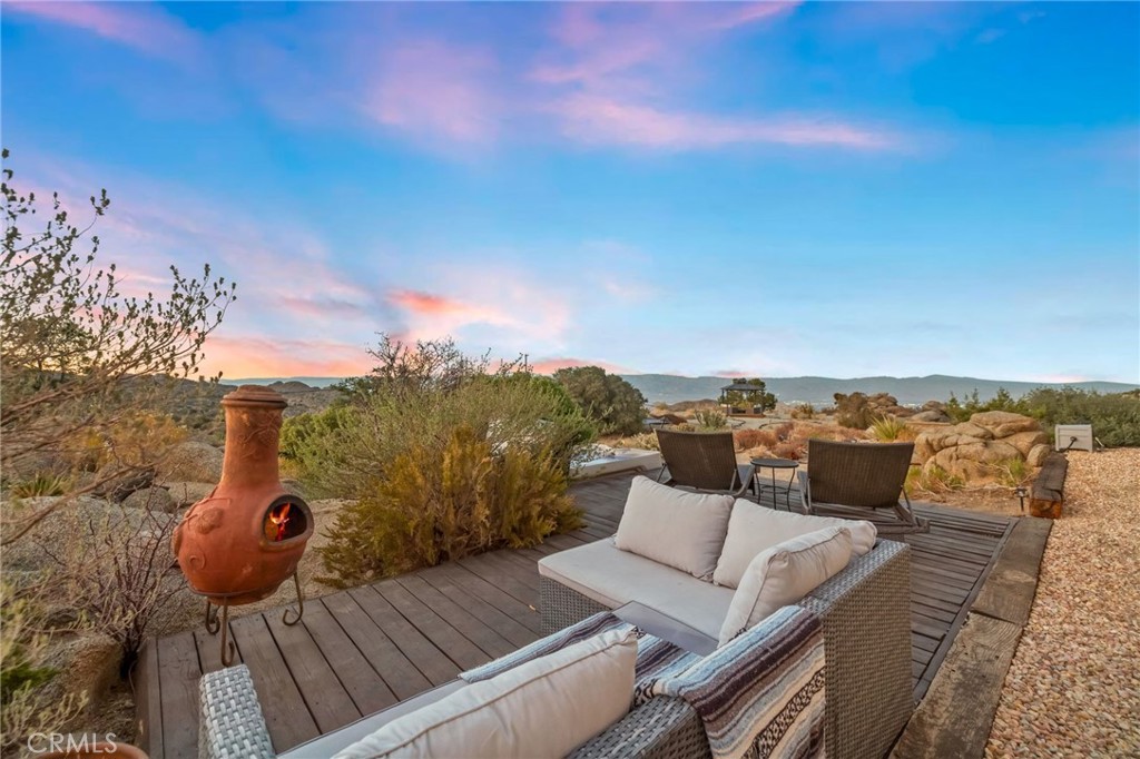 60150 Santa Rosa Road Mountain Center, CA 92561 - Photo 38 of 49 aerial view of a terrace with couches and sky view