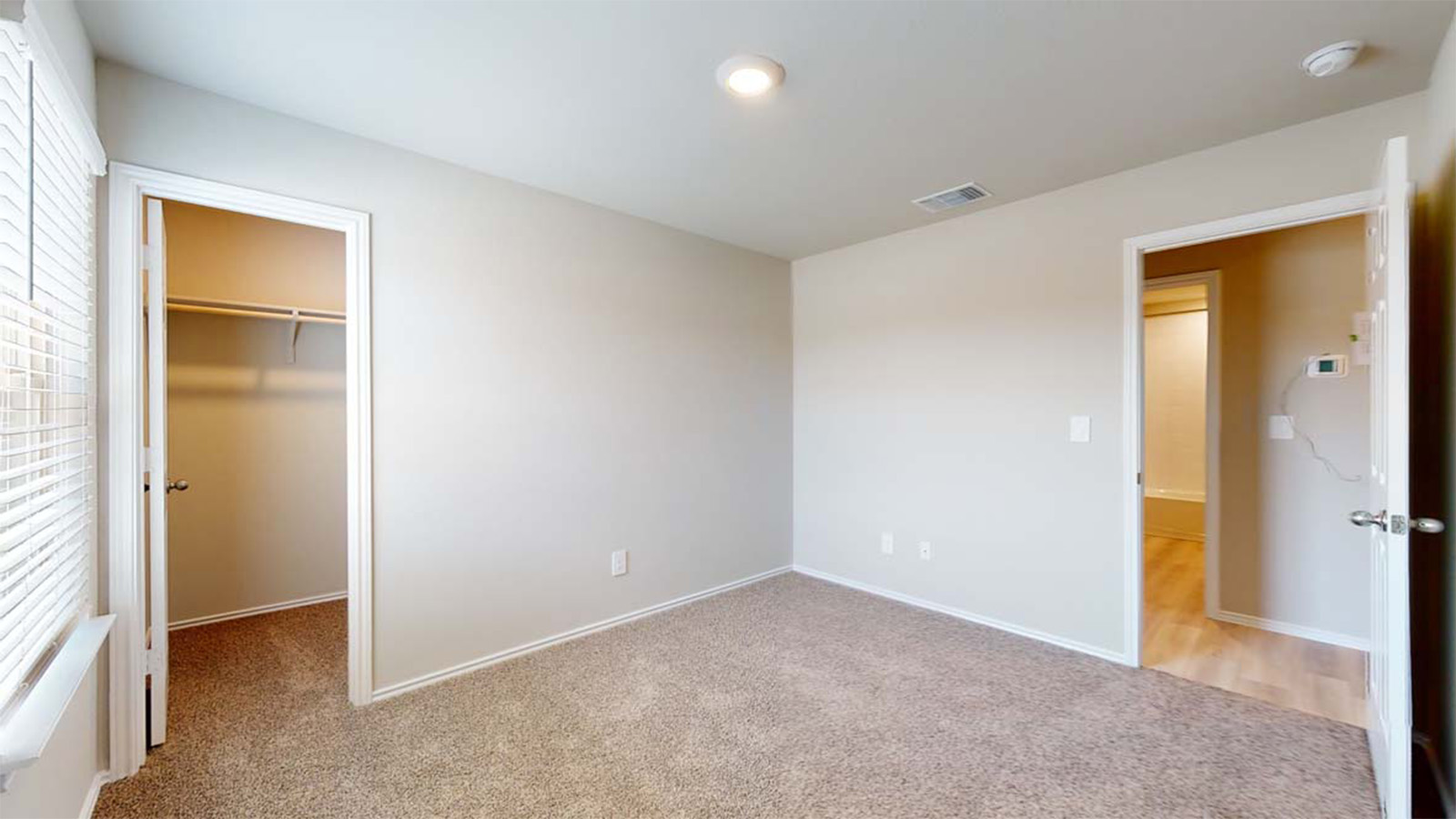 1312 Victory Rnch Trail Killeen, TX 76549 - Photo 17 of 22 Unfurnished bedroom with a spacious closet and light carpet