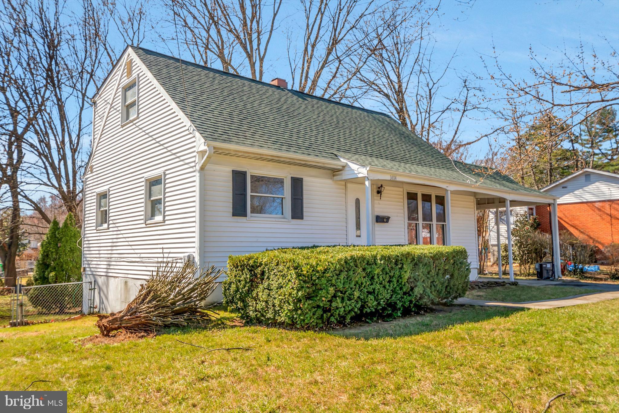 14114 Grayson Road Woodbridge, VA 22191 - Photo 1 of 28 a view of house that has a yard