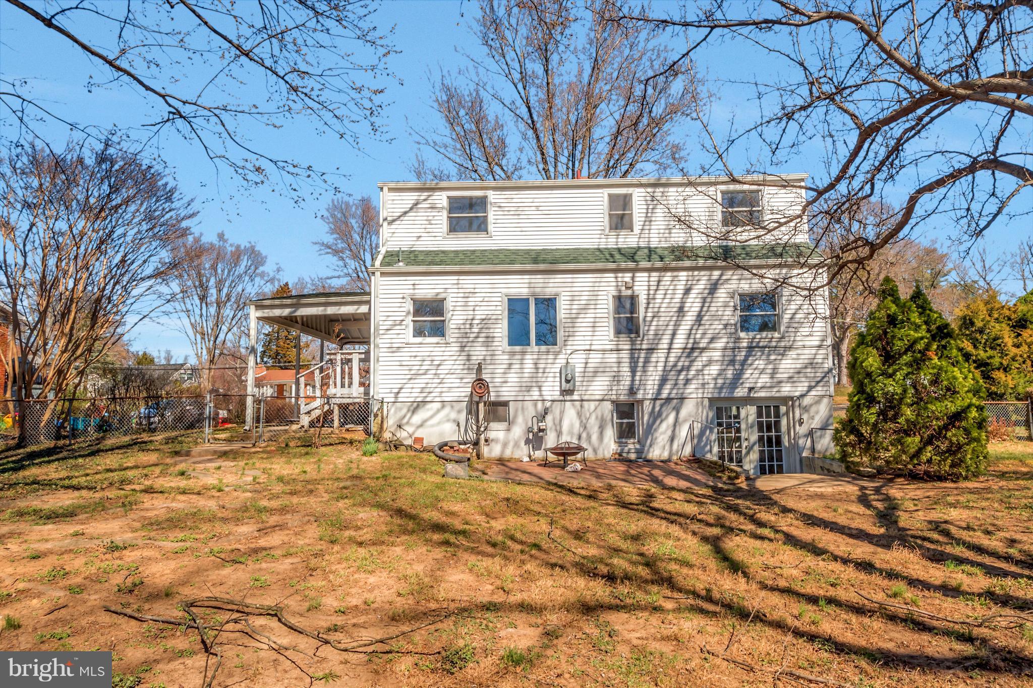14114 Grayson Road Woodbridge, VA 22191 - Photo 2 of 28 a front view of a house with a yard