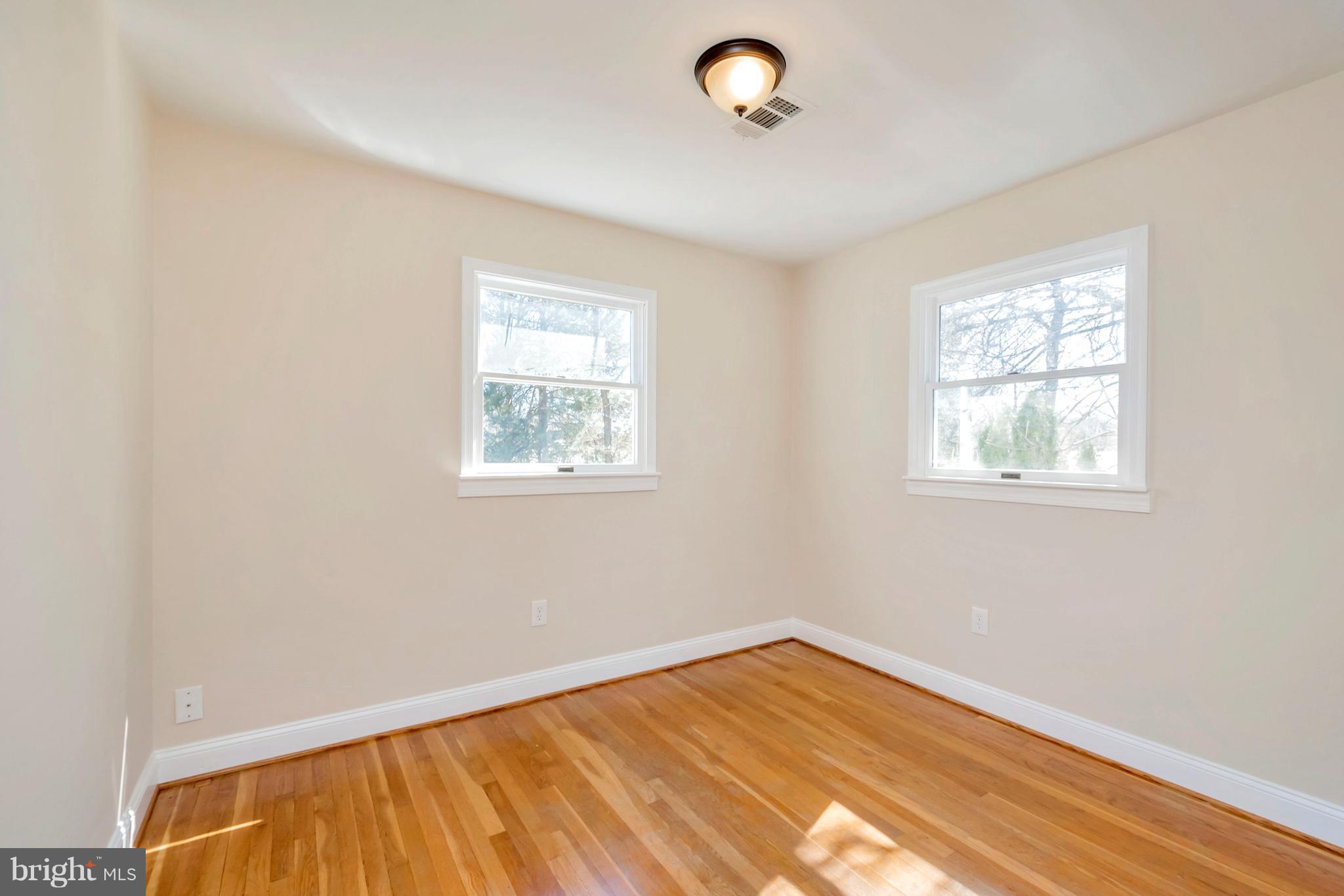 14114 Grayson Road Woodbridge, VA 22191 - Photo 15 of 28 an empty room with a window