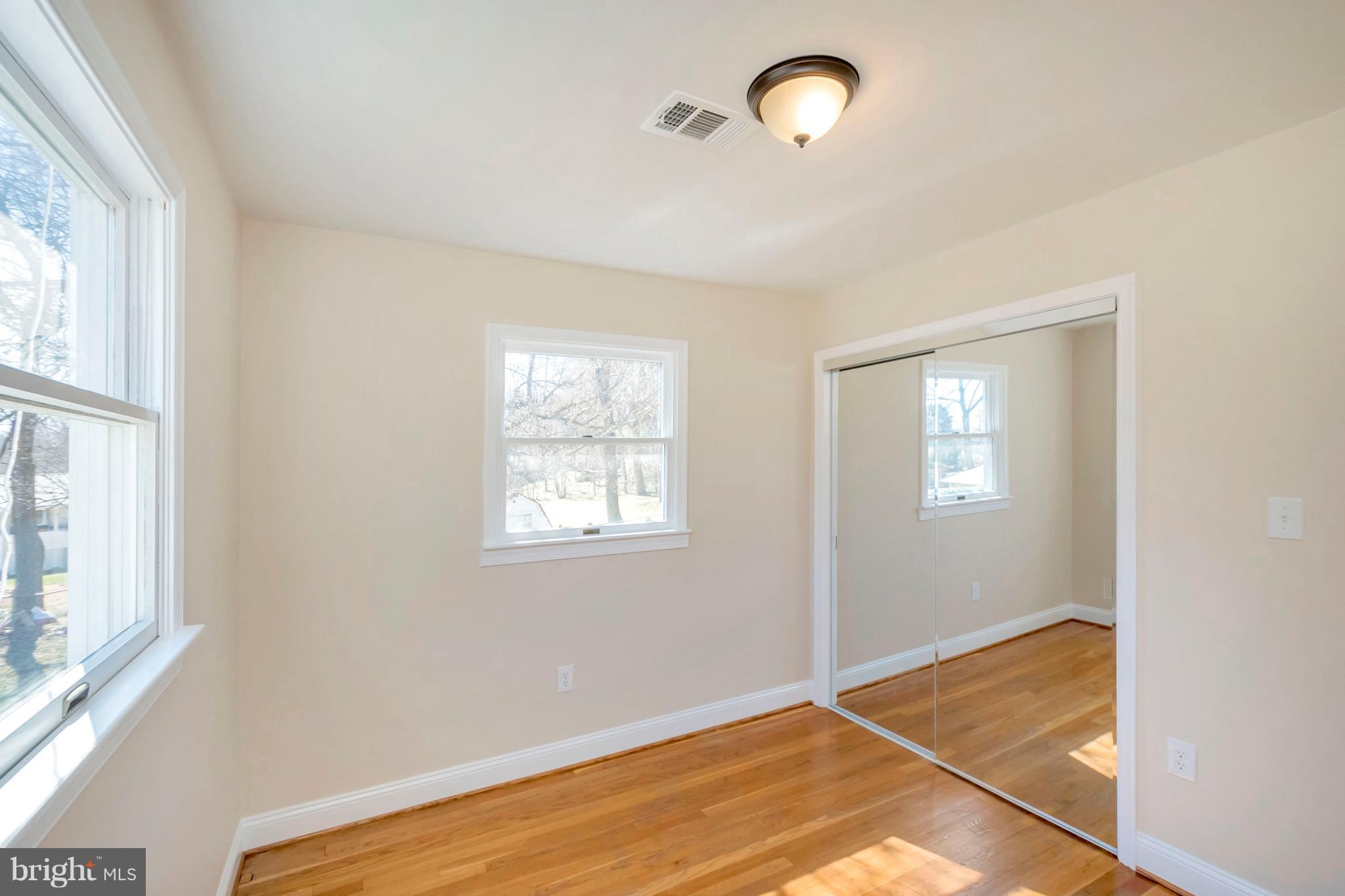 14114 Grayson Road Woodbridge, VA 22191 - Photo 16 of 28 a view of room with window and ceiling fan
