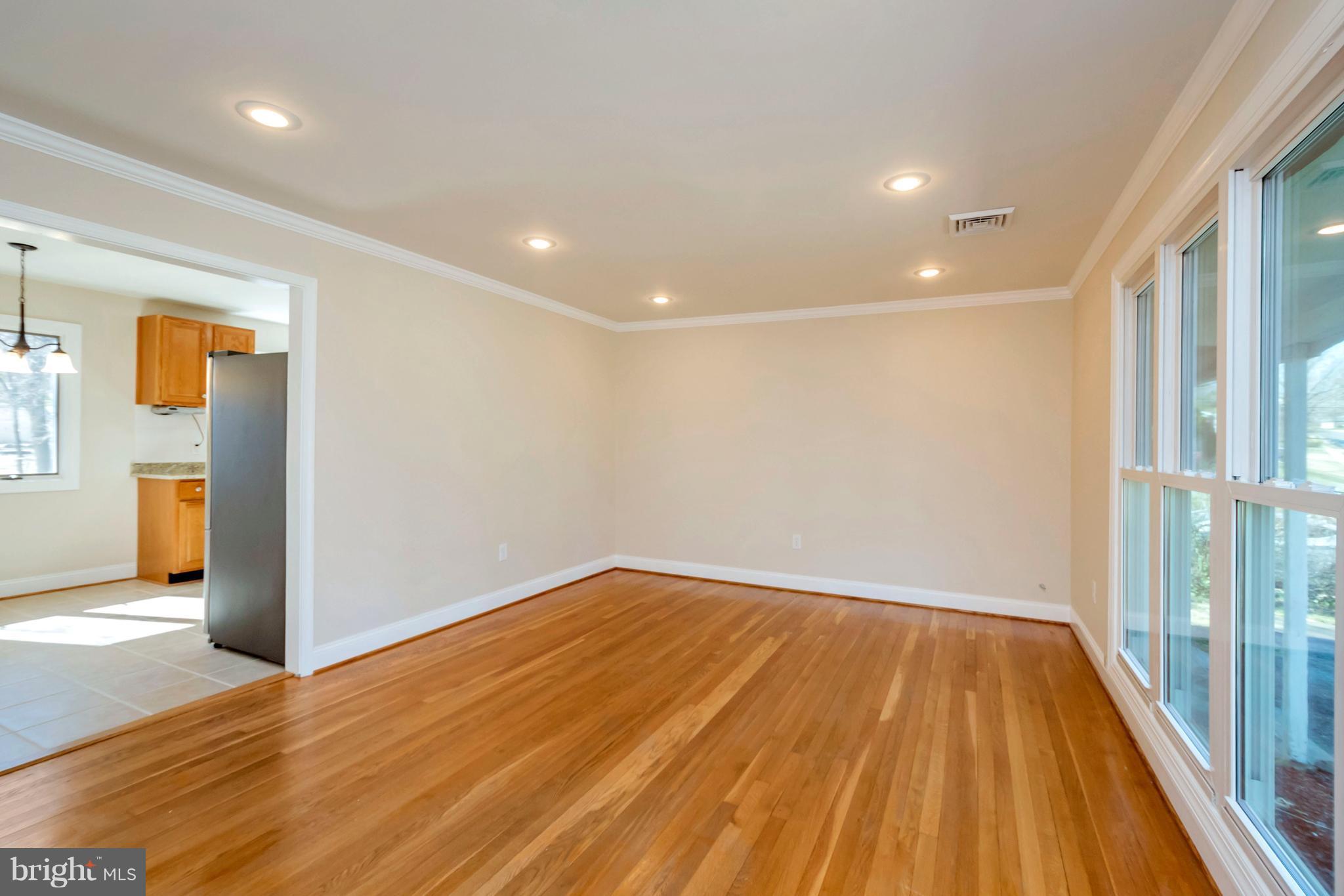14114 Grayson Road Woodbridge, VA 22191 - Photo 3 of 28 a view of empty room with wooden floor