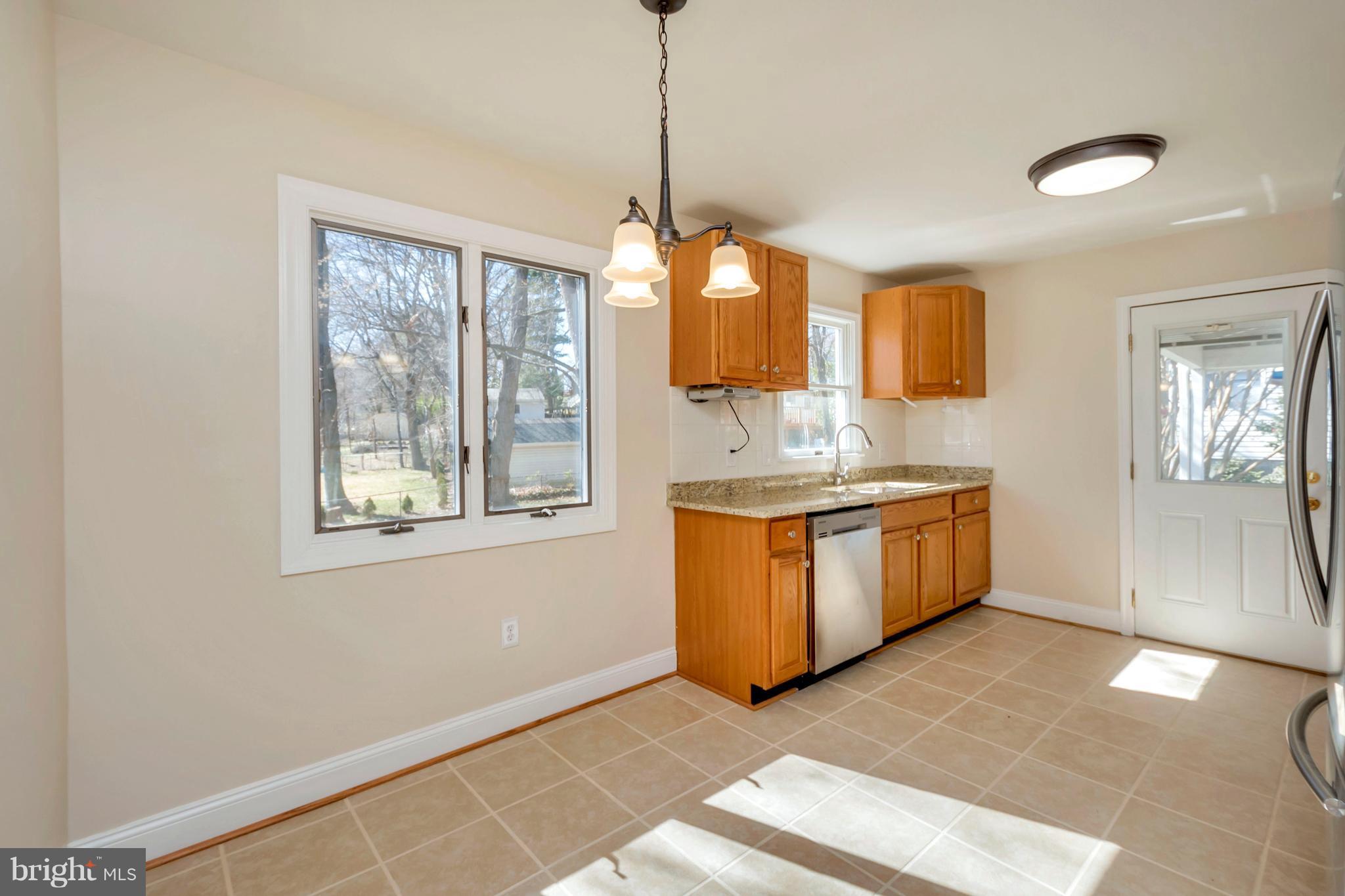 14114 Grayson Road Woodbridge, VA 22191 - Photo 6 of 28 a kitchen with sink and window