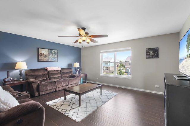 2050 Stapleton Road New Lenox, IL 60451 - Photo 18 of 38 a living room with furniture and a window