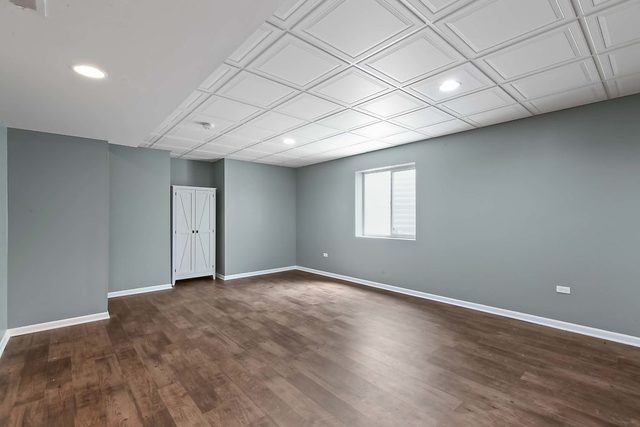 2050 Stapleton Road New Lenox, IL 60451 - Photo 32 of 38 a view of an empty room with wooden floor