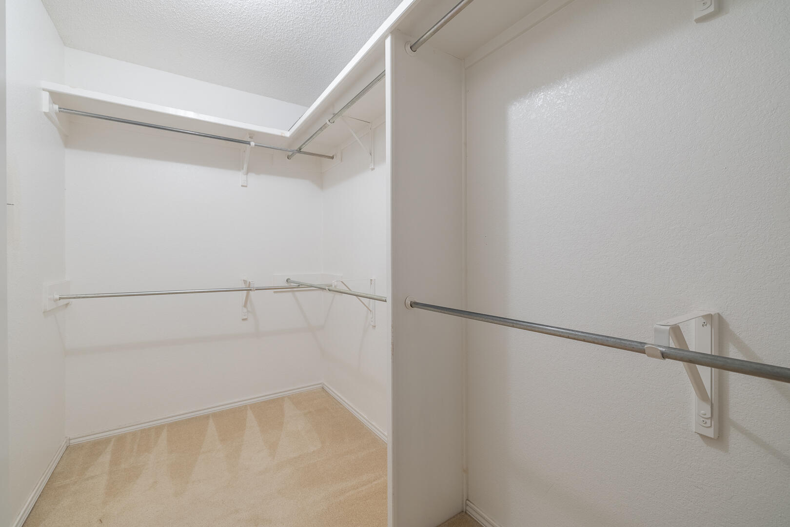 5415 68th Street Lubbock, TX 79424 - Photo 23 of 57 a view of an empty walk in closet