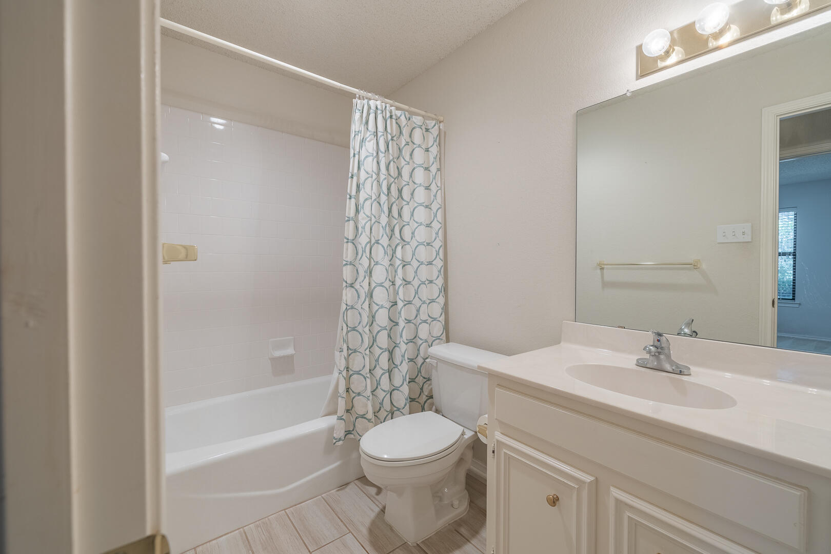 5415 68th Street Lubbock, TX 79424 - Photo 27 of 57 a bathroom with a sink toilet and shower