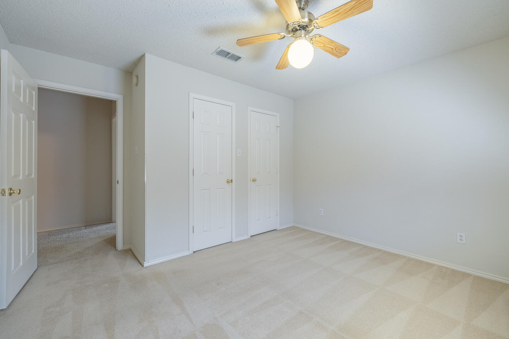 5415 68th Street Lubbock, TX 79424 - Photo 30 of 57 an empty room with a fan and a fan