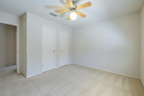 a white refrigerator freezer and a dishwasher in a kitchen