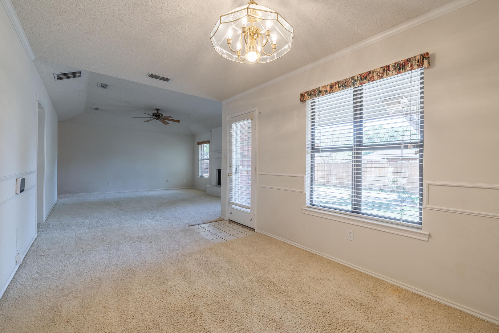 5415 68th Street Lubbock, TX 79424 - Photo 47 of 57 a view of an empty room with a window