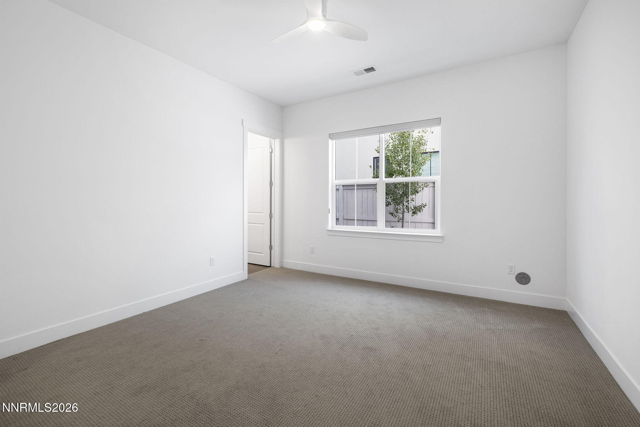 5406 Side Saddle Trail Reno, NV 89511 - Photo 14 of 39 an empty room with windows