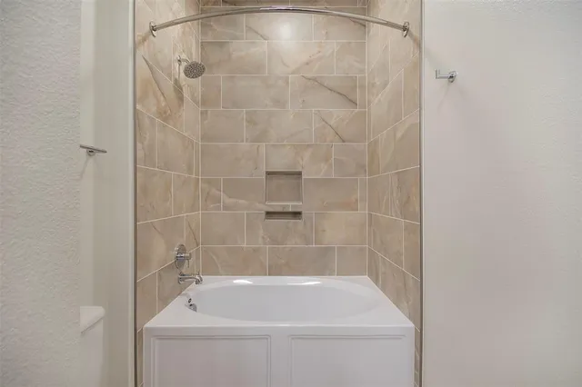 a bathroom with a bathtub