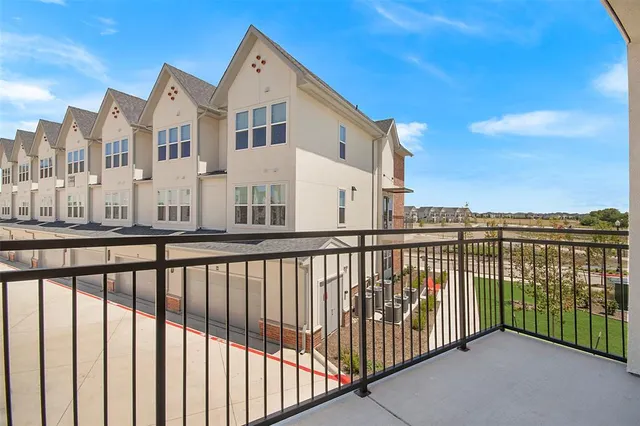 a view of city from a balcony