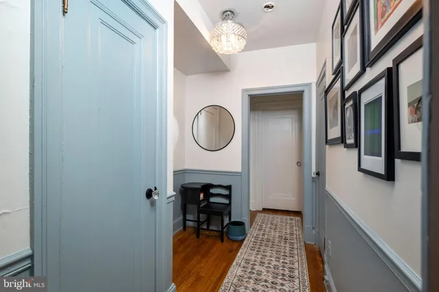 a picture of a bathroom with a sink and a mirror