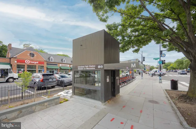 a view of a patio with table and chairs