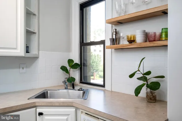 a vase of flowers sitting on a table