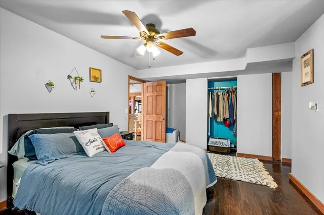 a living room with furniture a rug and a chandelier