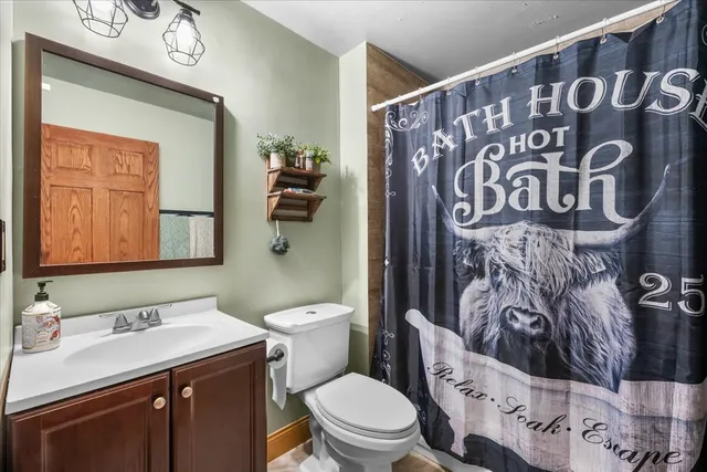 a kitchen with lots of counter top space and wooden floor