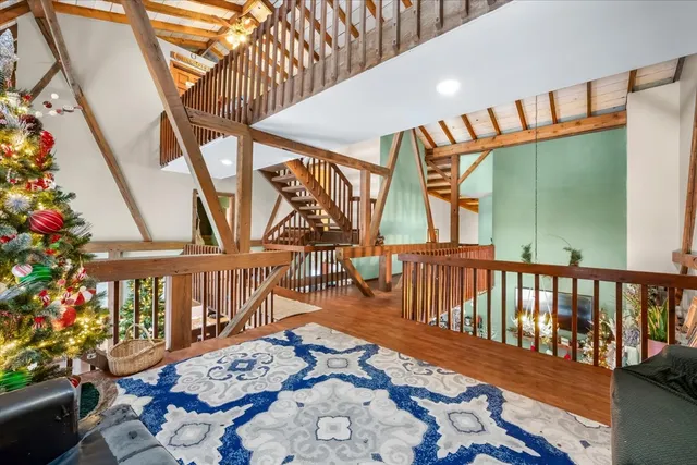 a view of walk in closet with clothes