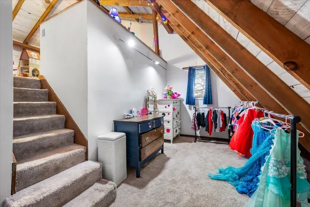 a kitchen with sink and refrigerator