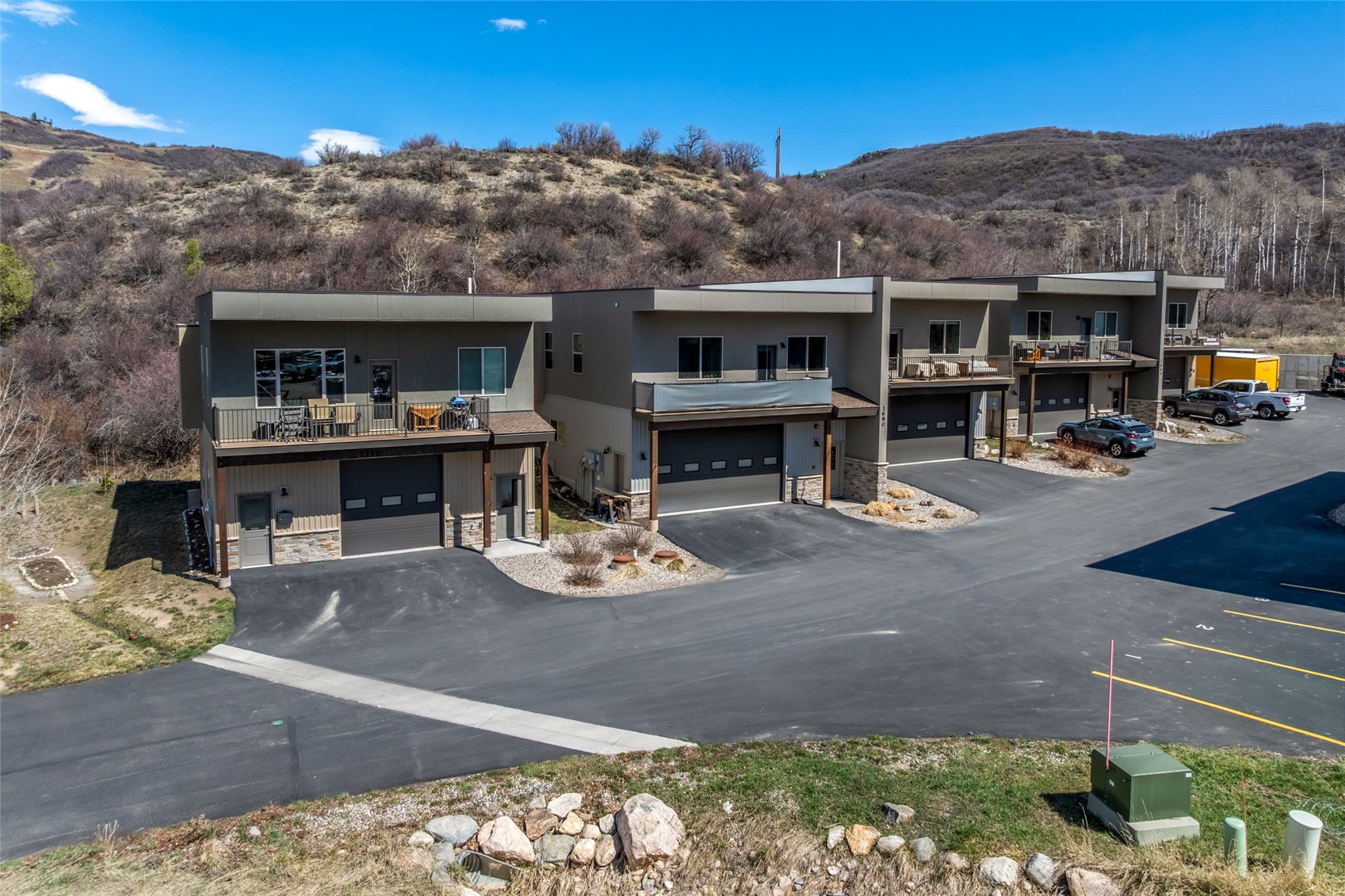 1680 Copper Ridge Drive, Unit 101 Steamboat Springs, CO 80487 - Photo 4 of 21 a view of a chairs and tables in the patio