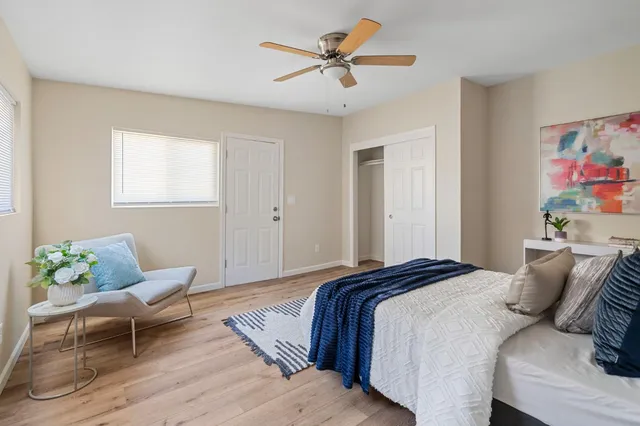 a swimming pool with outdoor seating and yard