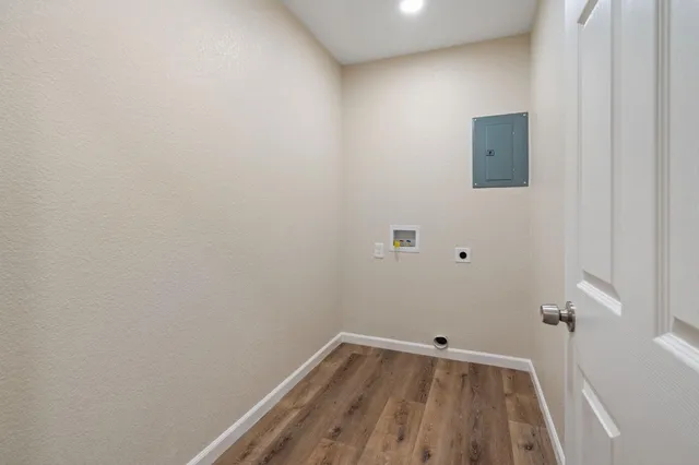 a view of swimming pool with a yard and lake view