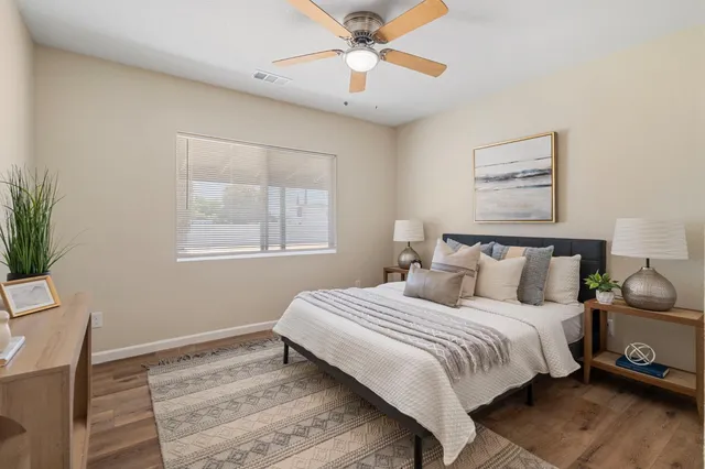 an aerial view of residential houses with outdoor space