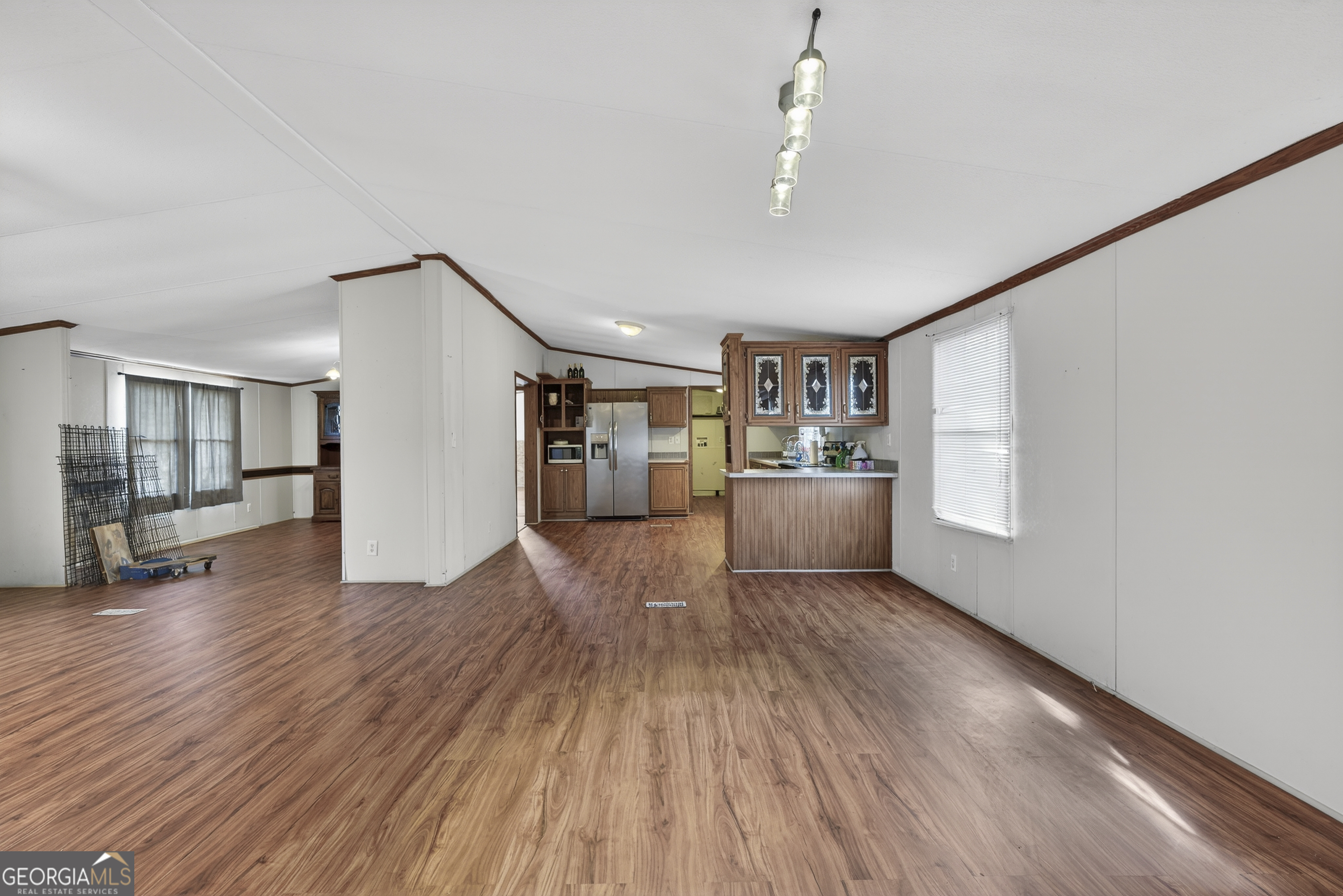 157 Linstead Drive Macon, GA 31216 - Photo 14 of 42 a view of a room with wooden floor closet and windows