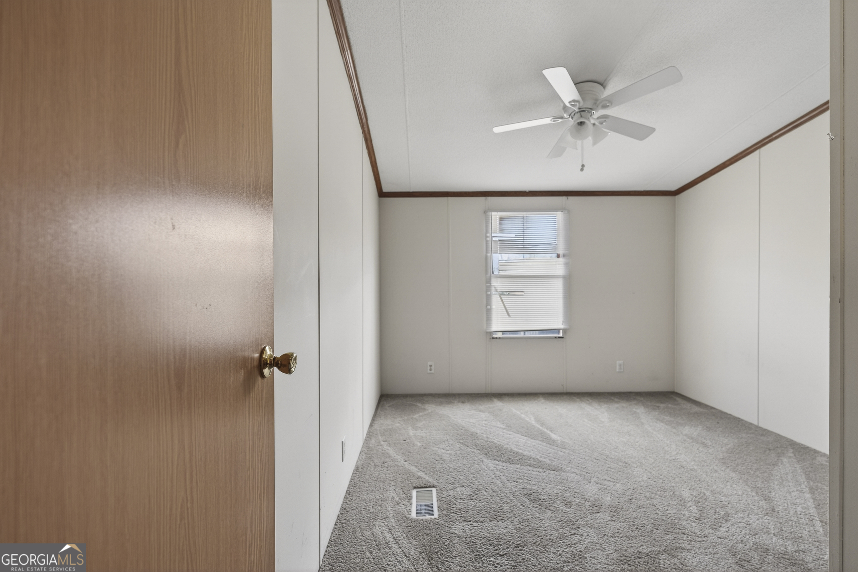 157 Linstead Drive Macon, GA 31216 - Photo 27 of 42 a view of an empty room and a window