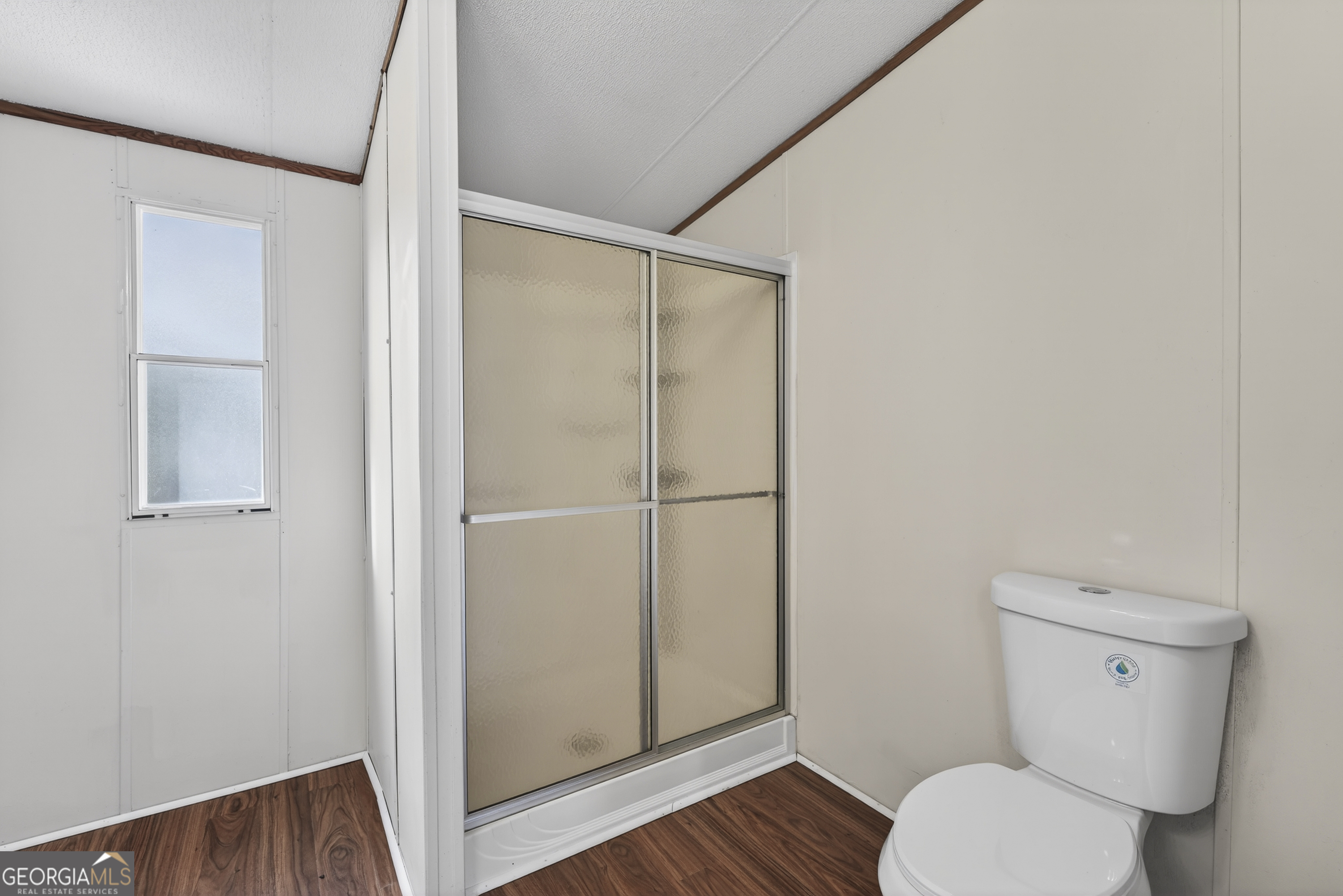 157 Linstead Drive Macon, GA 31216 - Photo 32 of 42 a white toilet sitting next to a shower