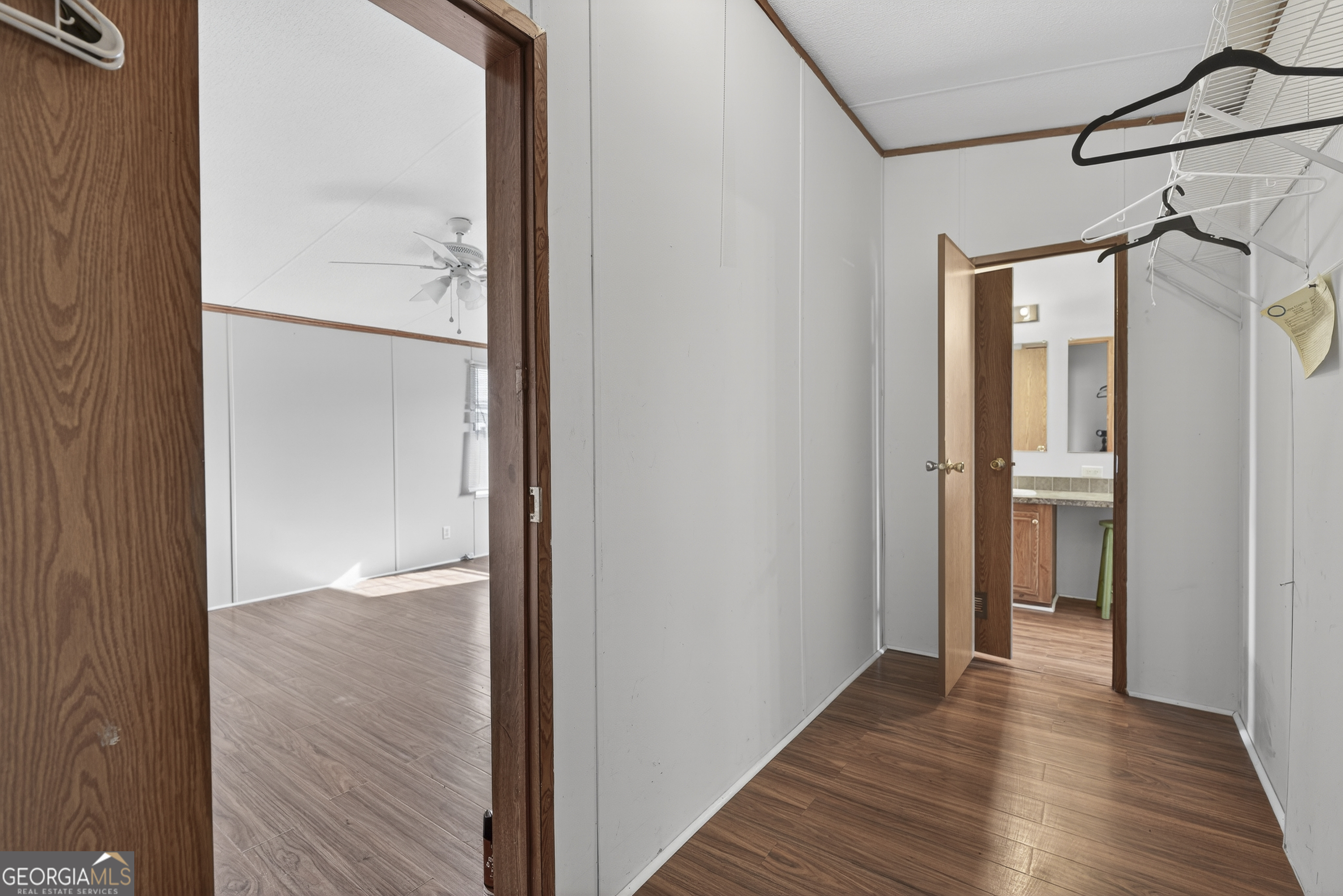 157 Linstead Drive Macon, GA 31216 - Photo 35 of 42 a view of a hallway with wooden floor