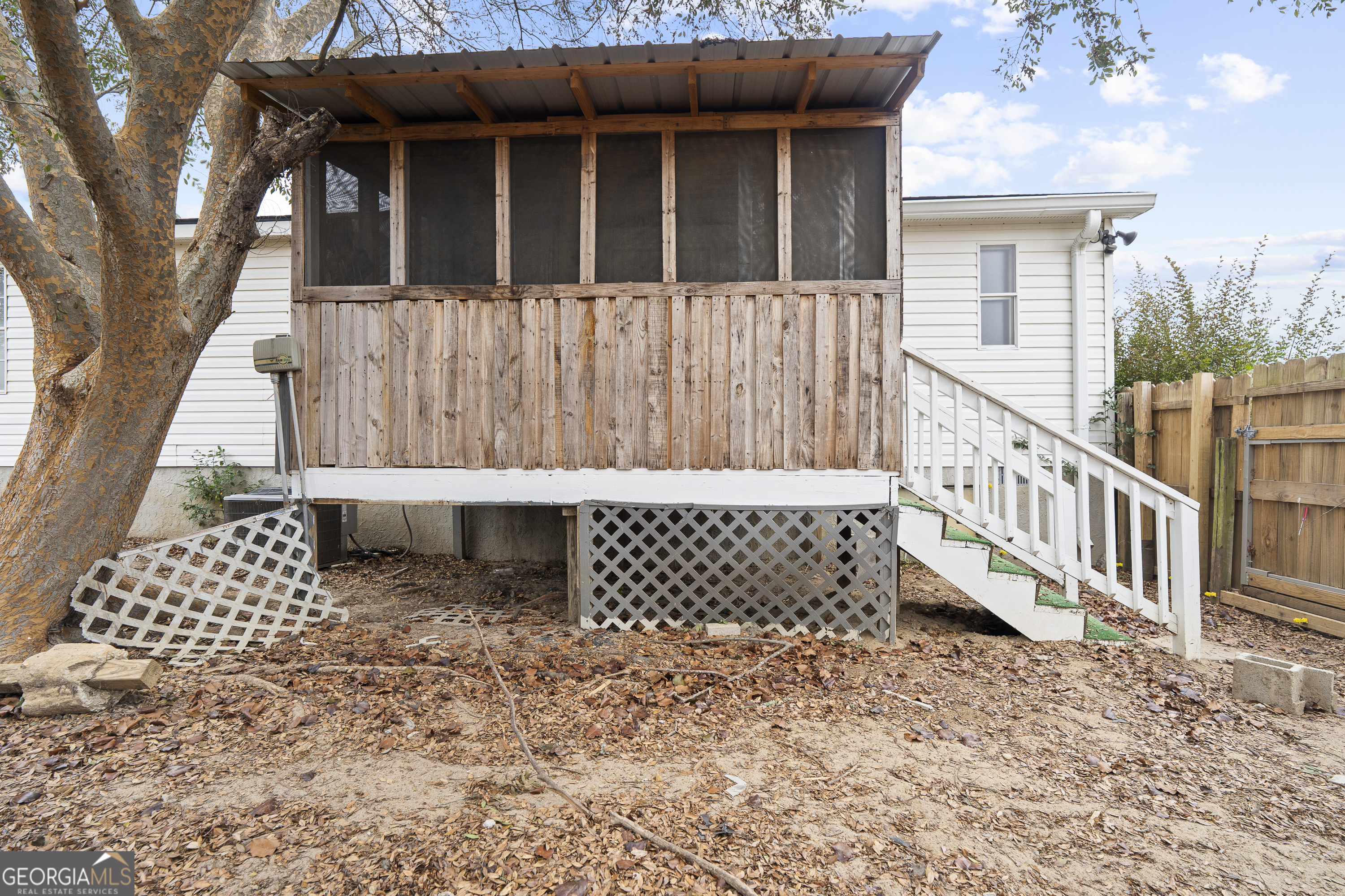 157 Linstead Drive Macon, GA 31216 - Photo 42 of 42 a view of a house with wooden fence
