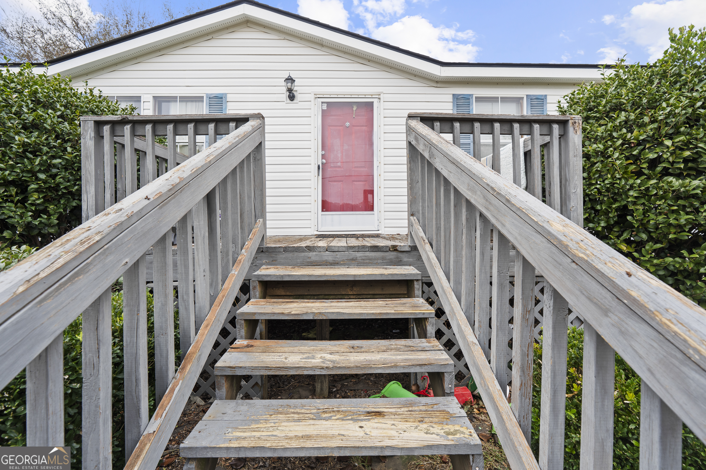 157 Linstead Drive Macon, GA 31216 - Photo 6 of 42 a view of staircase with wooden floor and white walls